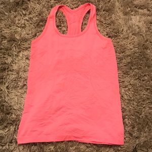 Bright pink lululemon tank